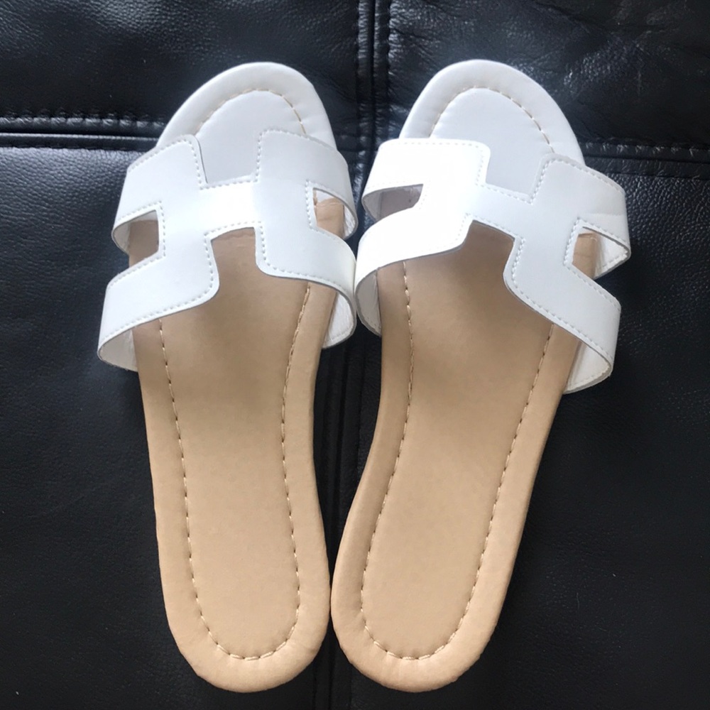 NWT White “H” Slip-On Flat Sandals